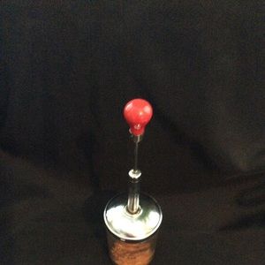 Vintage RED handle glass measuring cut and chopper